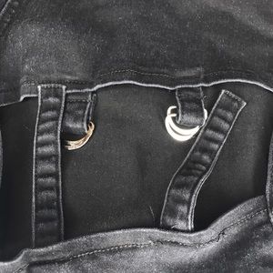 Black buckle jeans